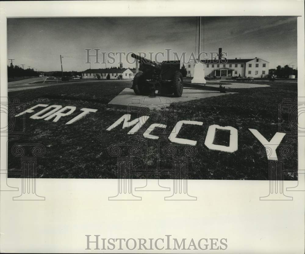 1978 A sign and cannon at entrance to Fort McCoy headquarters - Historic Images