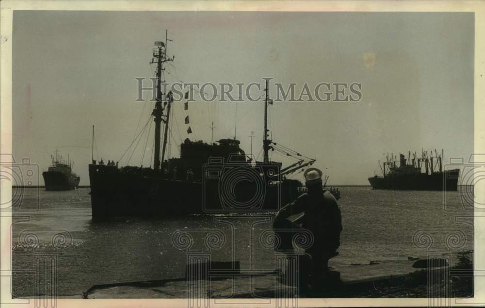 Three Navy Boats, Sailor reclines - Historic Images