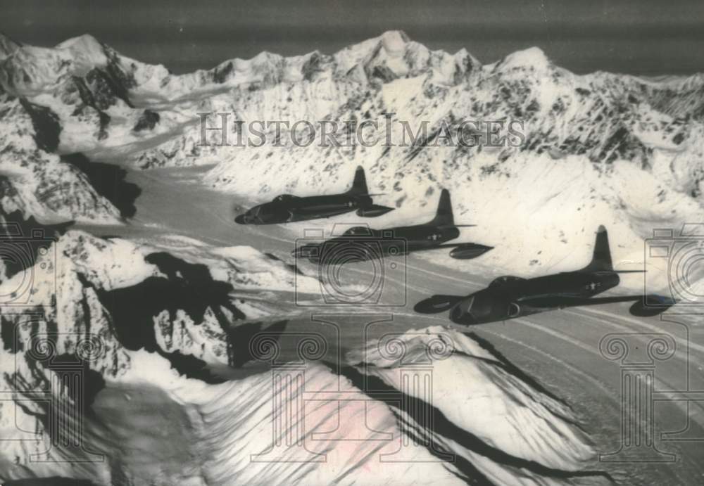 1951 Ffighter jets perform maneuver over Alaska for Korean War - Historic Images