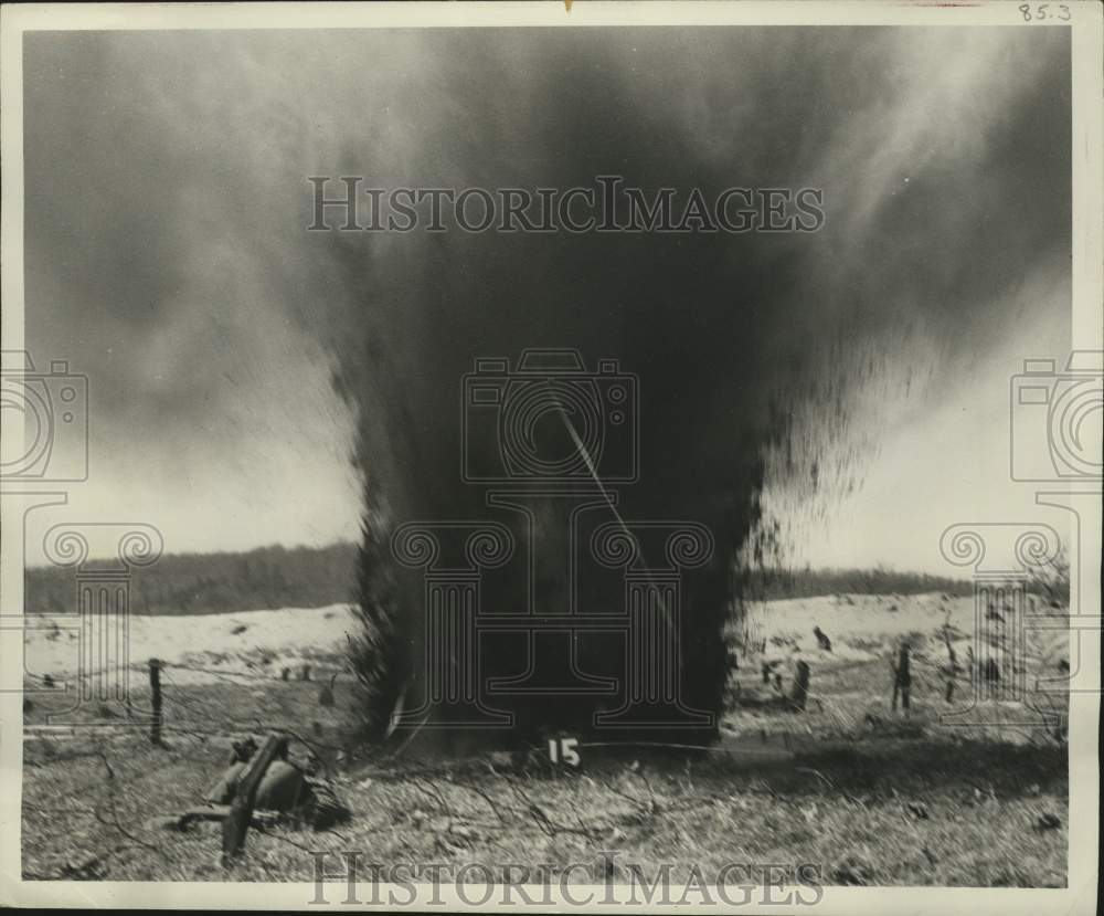 1951 Press Photo Buried dynamite explodes on army training course at Camp McCoy. - Historic Images