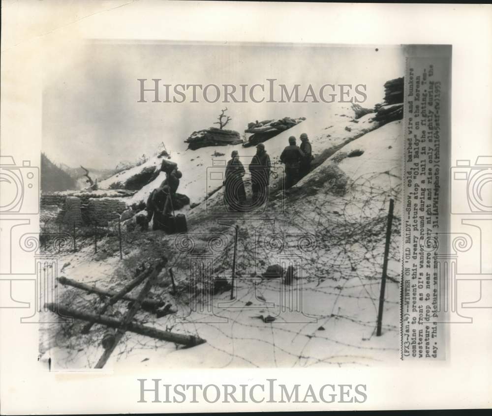 1953 American soldiers stop "Old Baldy" on the Korean western front-Historic Images
