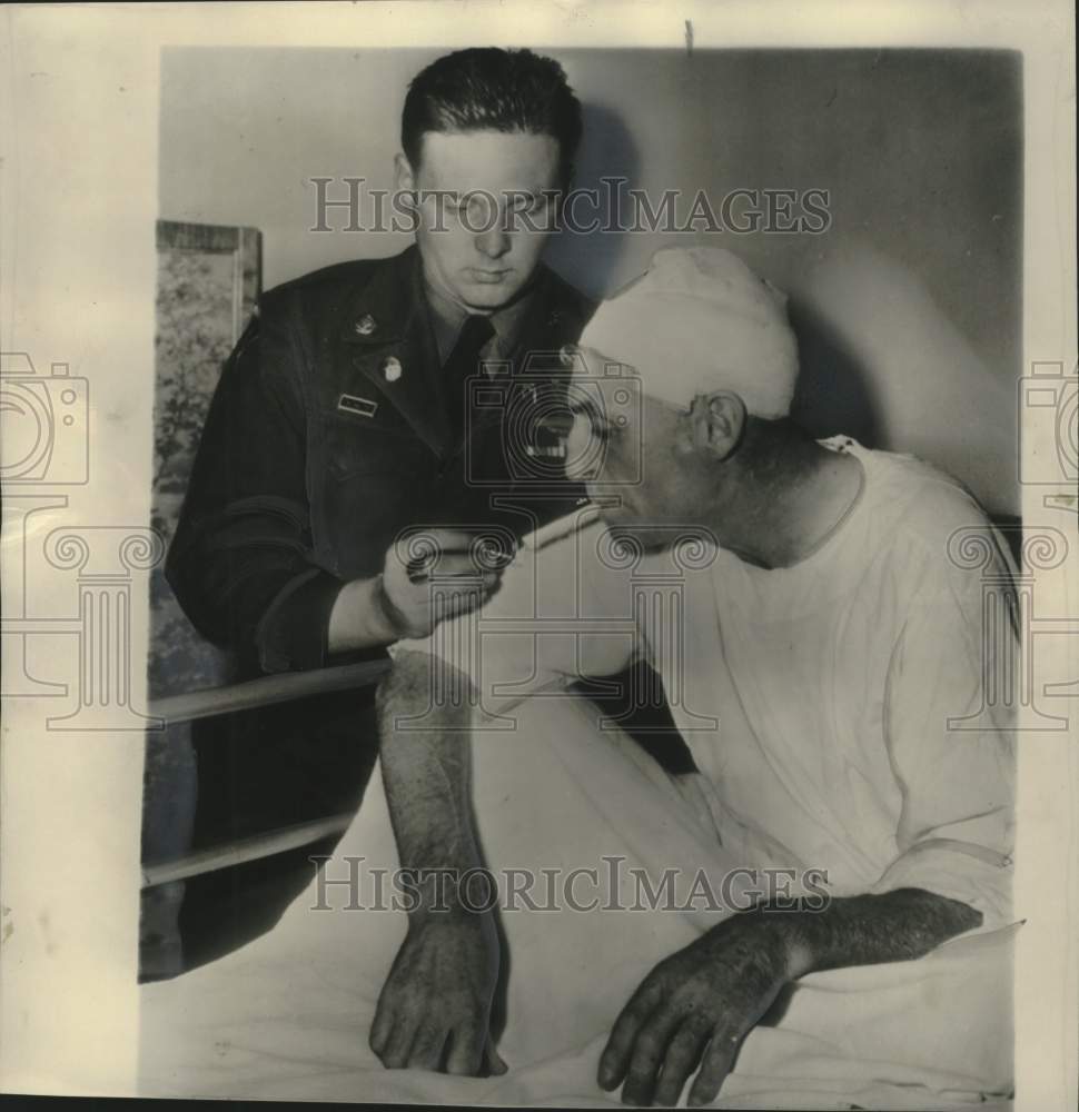 1951 Press Photo Pfc Jack B. Alcorn with his Stepfather in Dubuque, IA Hospital - Historic Images