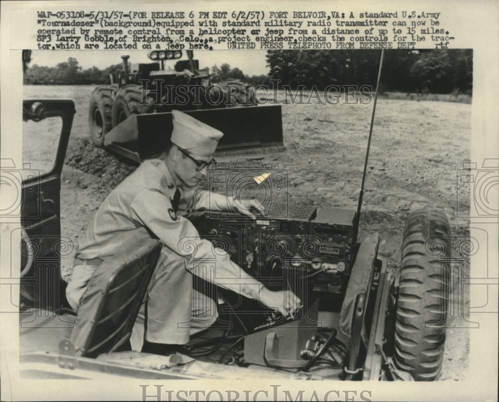 1957 Army engineer Larry Gobble operates tractor with remote control-Historic Images