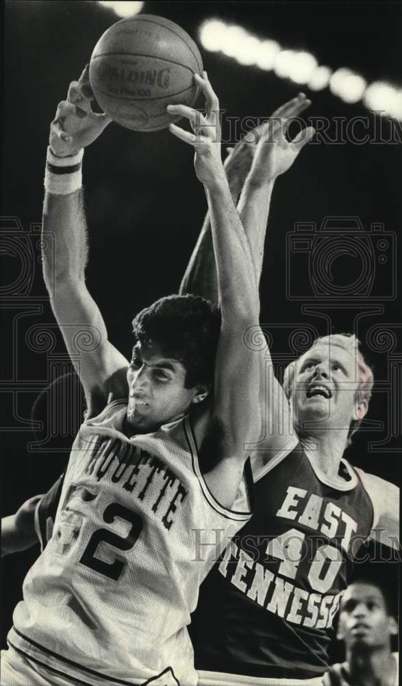 Press Photo Marquette forward Marc Marotta grabs basketball in Arena game - Historic Images