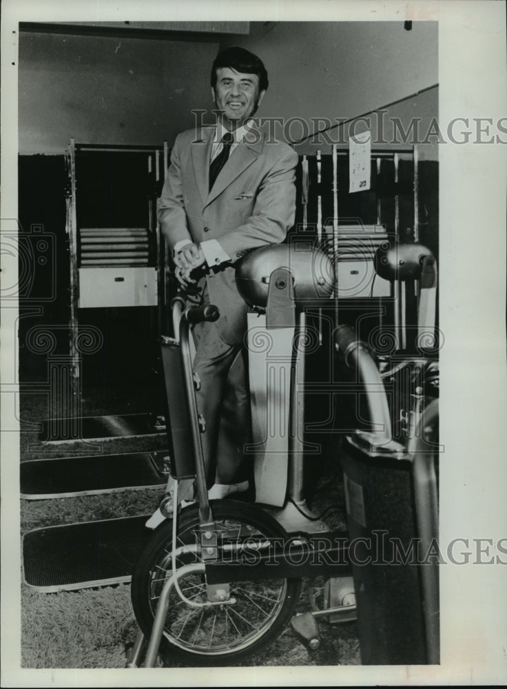 1971 Ed Allen with exercise equipments  - Historic Images