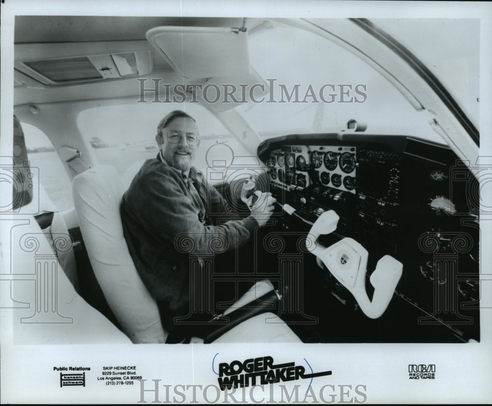 1983 Press Photo Roger Whittaker, Musician in a Plane - mjp03305 - Historic Images