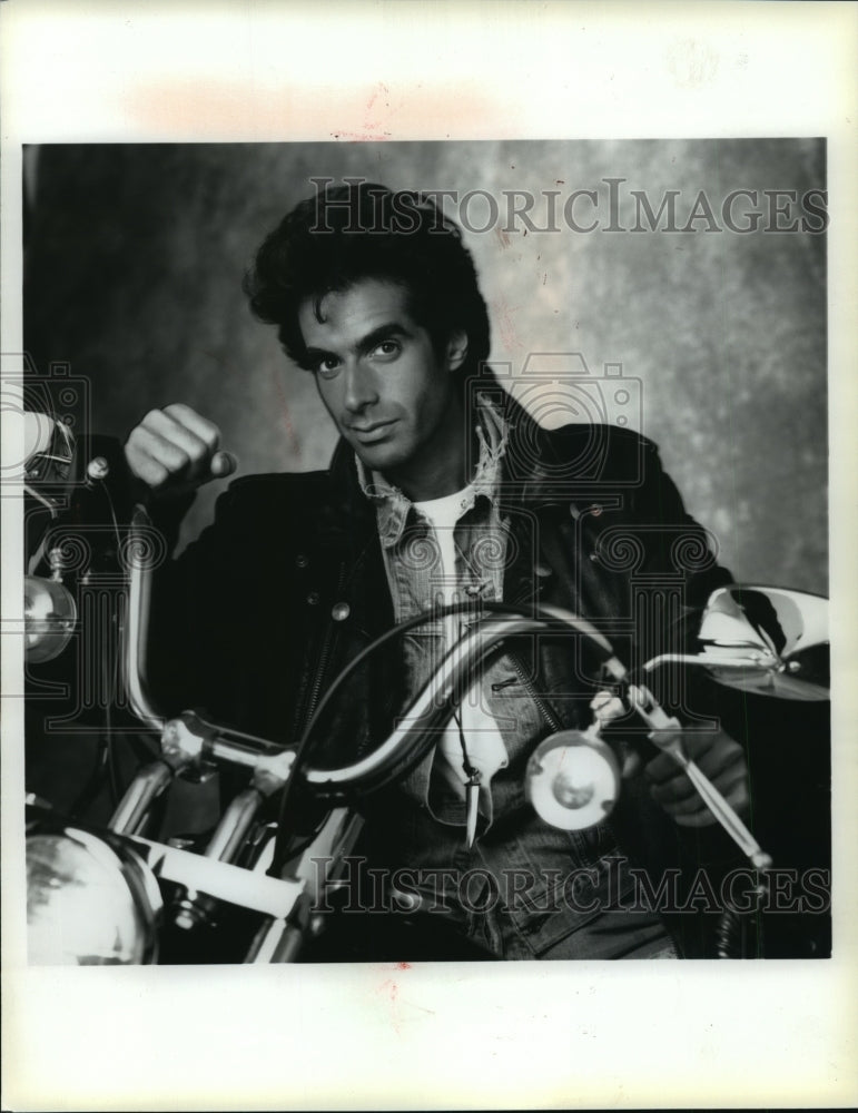 1990, David Copperfield, Magician, with motorcycle - mjp07856 - Historic Images