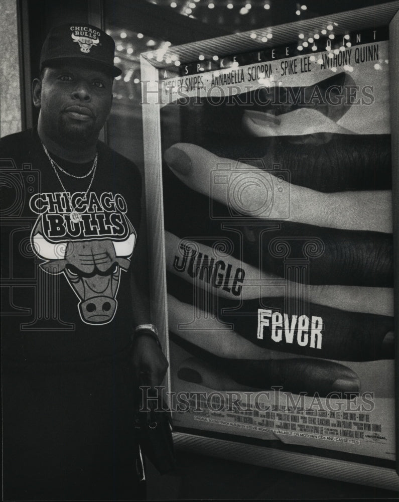 1991, Henry Swope Jr. Next to a Poster for &quot;Jungle Fever&quot; - mjp08075 - Historic Images
