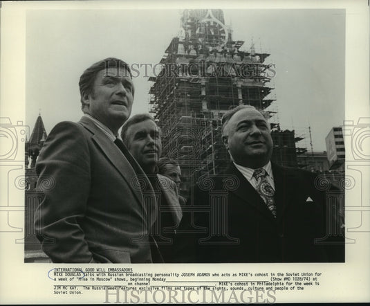 1975, Mike Douglas talks with Russian broadcaster Joseph Adamov - Historic Images
