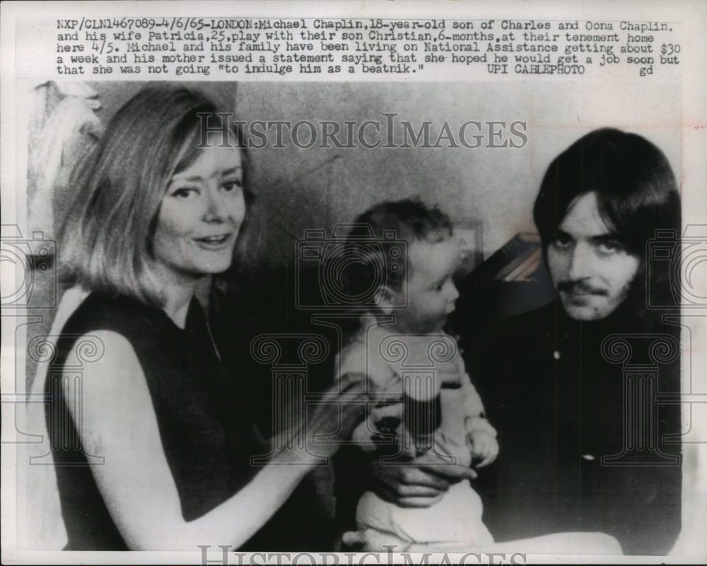 1965, Micheal and Patricia Chaplin with son, Christian in London. - Historic Images