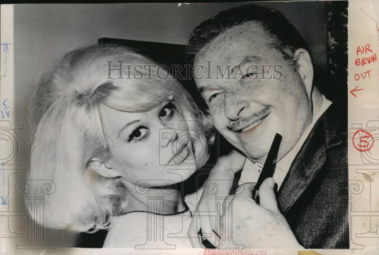1964 Press Photo Bandleader Xavier Cugat and singer Charo Baeza in New York. - Historic Images