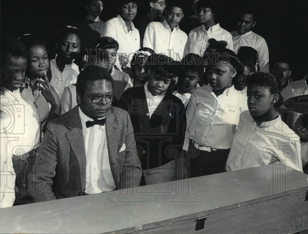 1985, Pianist Tony Davis entertains at Burroughs Middle School. - Historic Images