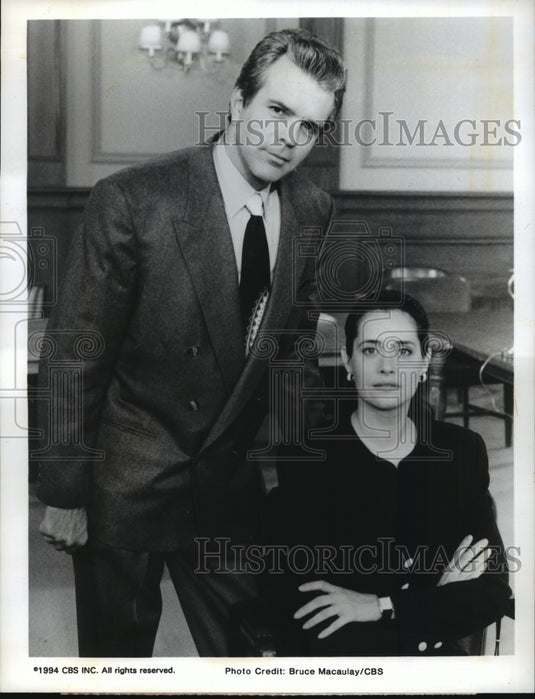 1994, Tony Denison and Lorraine Bracco star in Getting Gotti, on CBS. - Historic Images