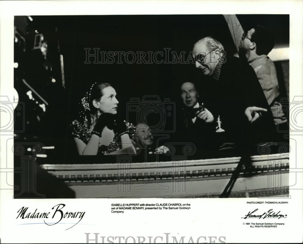 1991 Press Photo Isabelle Huppert and Claude Chabrol on set of Madame Bovary. - Historic Images