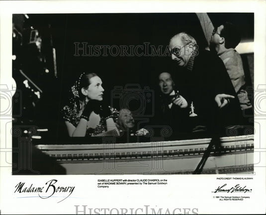 1991 Press Photo Isabelle Huppert and Claude Chabrol on set of Madame Bovary. - Historic Images