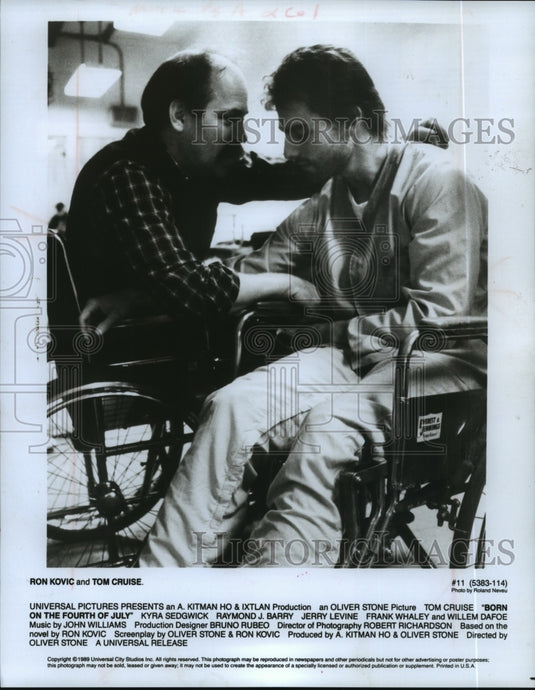 1989, Ron Kovic and Tom Cruise on set of Born on the Fourth of July. - Historic Images