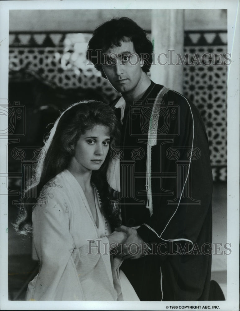 1986, Nancy Travis and Art Malik star in Harem, on ABC. - mjp11367 - Historic Images