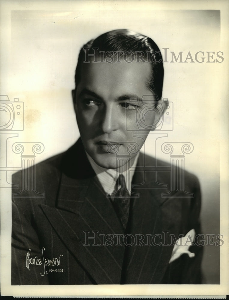 1943 Press Photo Percy Faith, conductor, composer & arranger on NBC program. - Historic Images