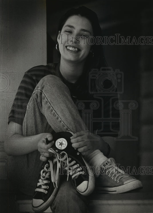1993 Press Photo Lauren Griliep displays her Converse shoes - mjp12351 - Historic Images