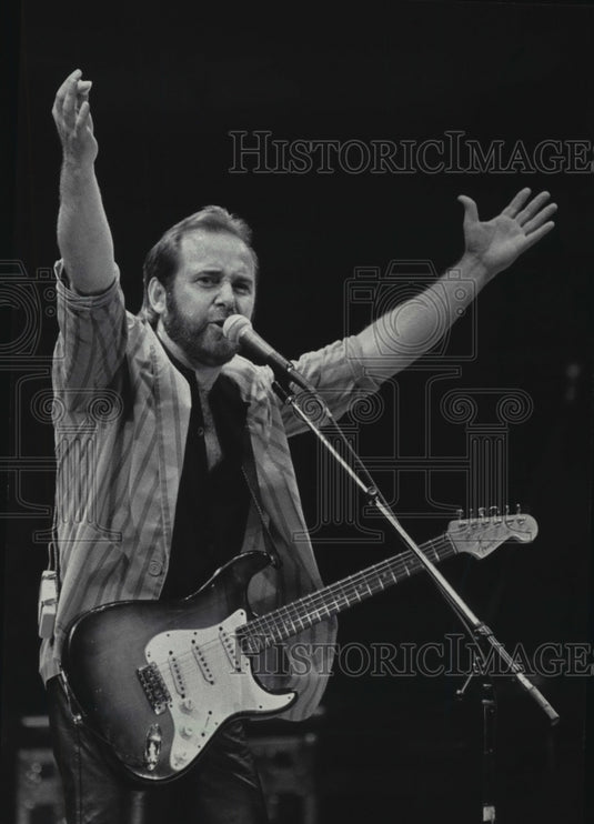 1985, J.P. Pennington of Exile, performs at Milwaukee Arena. - Historic Images