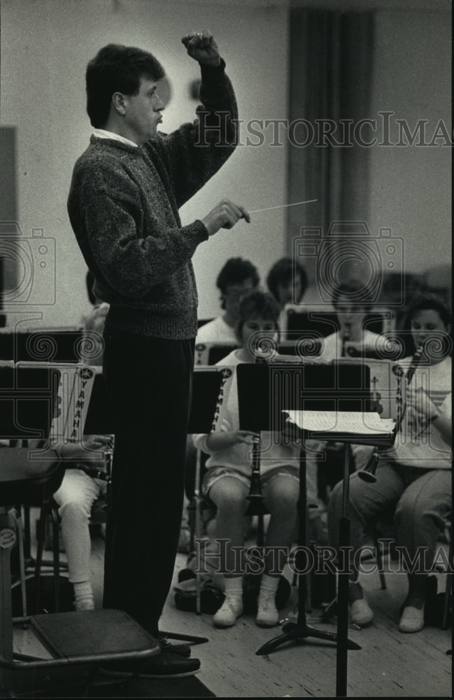 1988, Thomas Dvorak leads The Greater Milwaukee Youth Wind Ensemble. - Historic Images