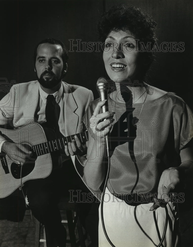 1981, Guitarist Tim Stemper and singer Pam Duronio at the Hyatt. - Historic Images