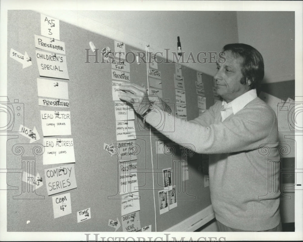 1974, Holllywood-Bob Finkel, producer, with Emmy breakdown board. - Historic Images