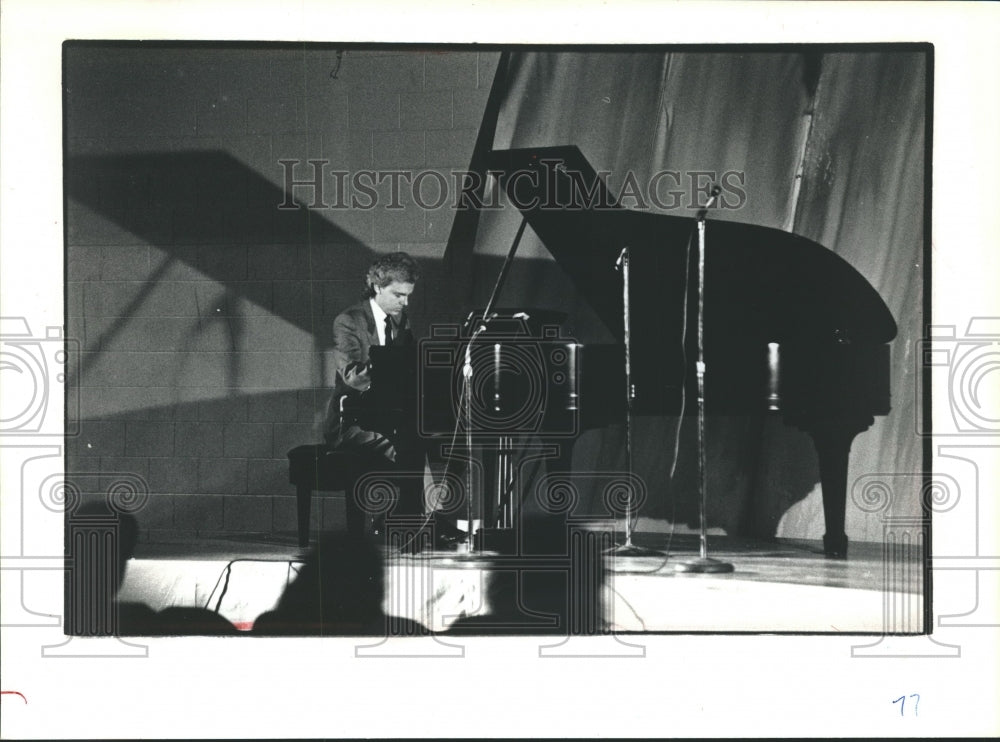 1990, Christopher Finkelmeyer performs at the piano at Fine Arts Day. - Historic Images
