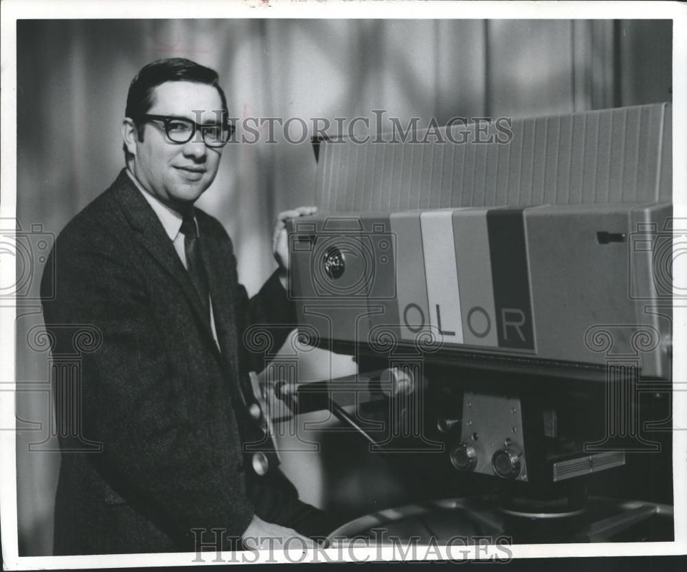 1969, Ron Fleissner standing next to Channel 10 television camera - Historic Images
