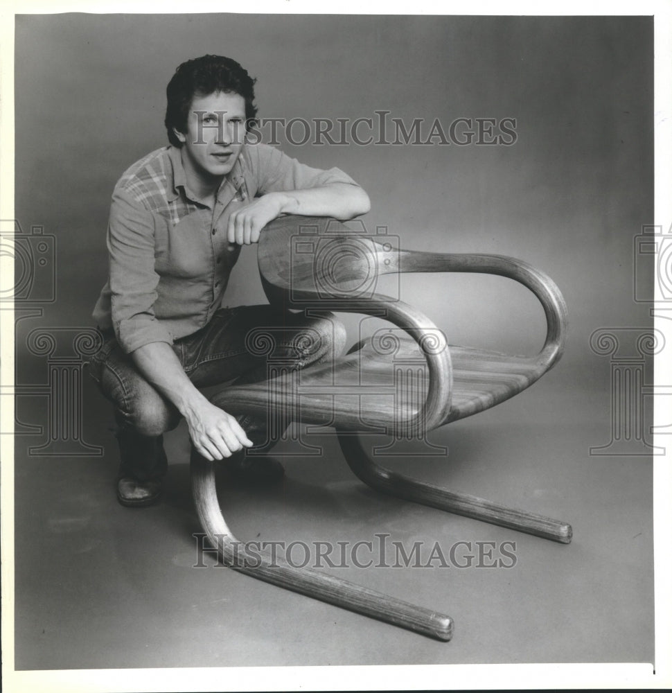 1980, David Flatt, furniture maker, with one of his chairs, Madison - Historic Images