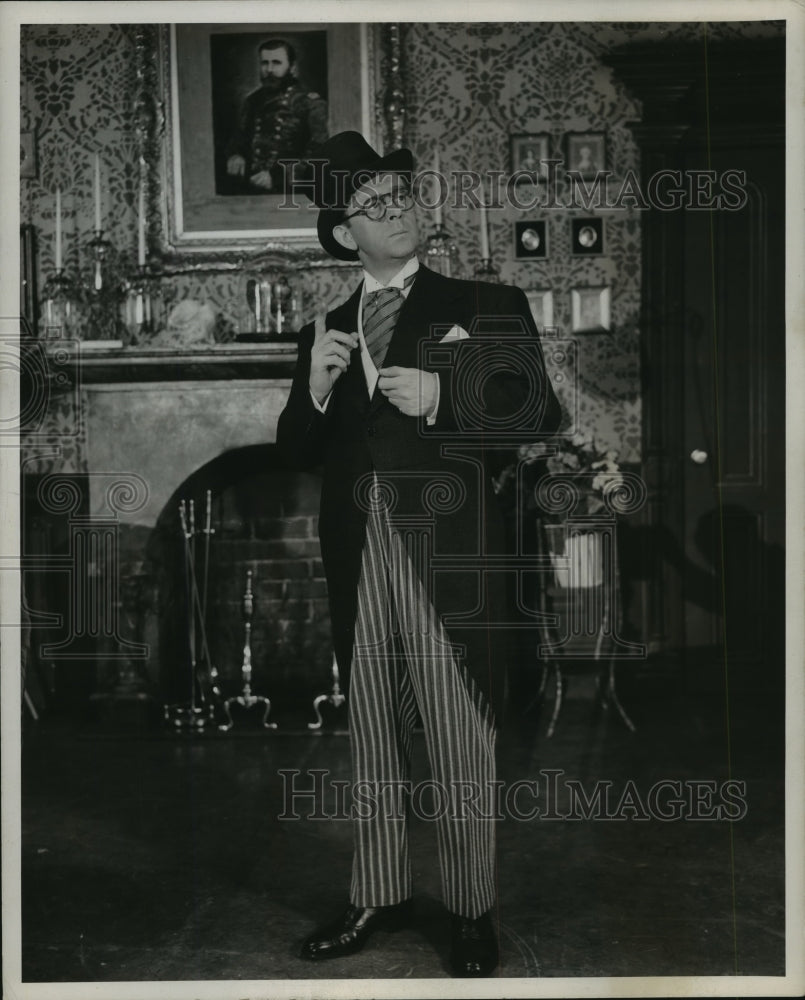 1949, Eddie Foy, Jr. in front of fireplace - mjp14781 - Historic Images
