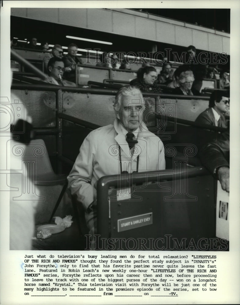 1984 Press Photo John Forsythe at horse track, Lifestyles of the Rich and Famous- Historic Images