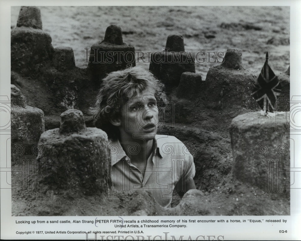 1977, Actor Peter Firth surrounded by a sand castle in "Equus" - Historic Images