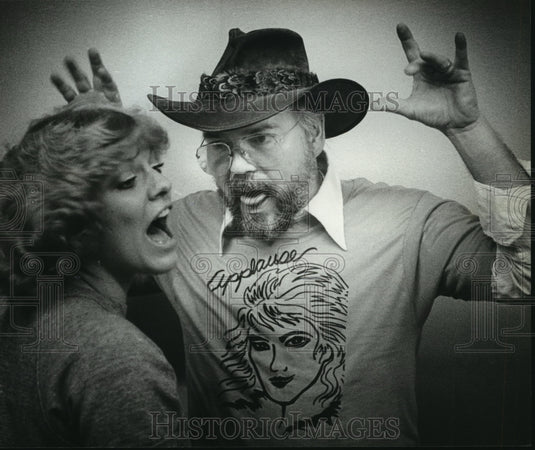 1983, David Eggebracht tried distracting Actress Juliann Sutherland - Historic Images