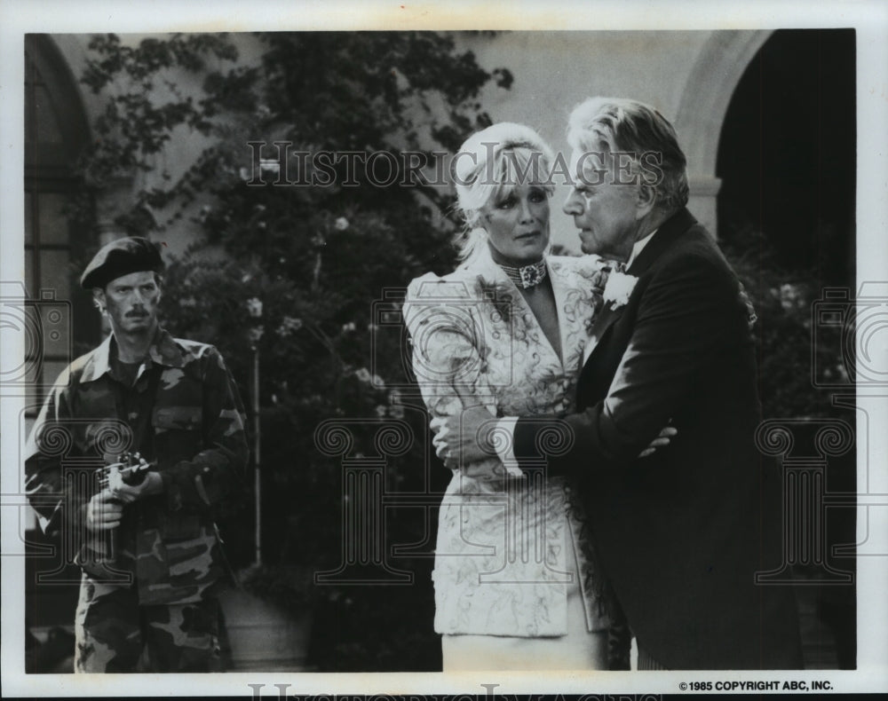 1985, Actors John Forsythe and Linda Evans in "Dynasty" - mjp15681 - Historic Images