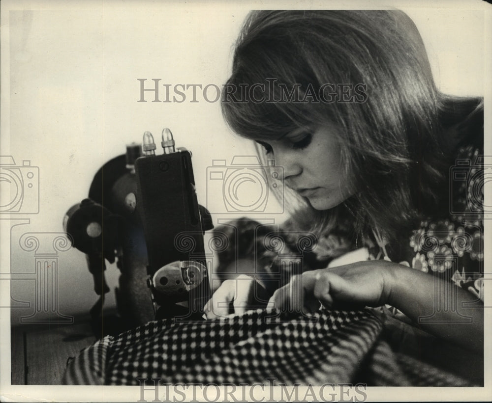 1963, Miss Garver is sewing at home - mjp15743 - Historic Images