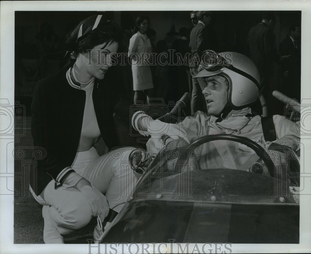 1969 Press Photo Actor Sean Garrison as race car driver with a co-star. - Historic Images