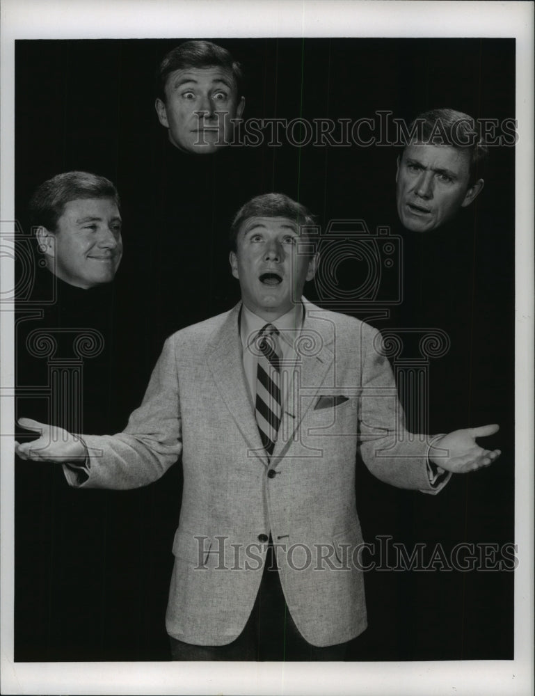 1969 Press Photo Merv Griffin, television personality, surrounded by his images - Historic Images