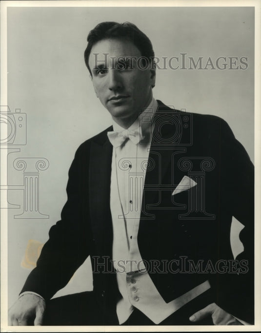 1988, Neal Gittleman debuts as Milwaukee's associate conductor. - Historic Images