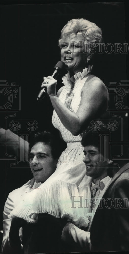1985, Mitzi Gaynor singing at the Riverside Theater, Wisconsin - Historic Images