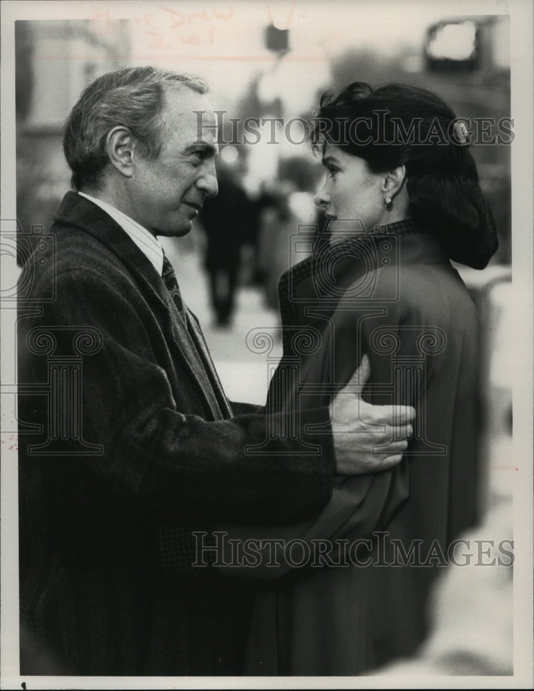 1990 Press Photo Ben Gazzara and Connie Sellecca in scene from "People Like Us" - Historic Images