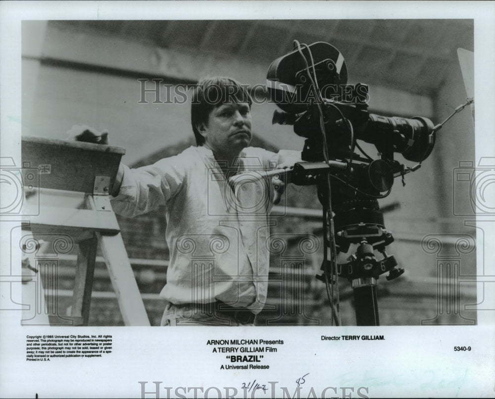 1986, Terry Gilliam, director of &quot;Brazil&quot; standing by camera - Historic Images