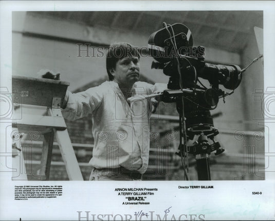 1986, Terry Gilliam, director of "Brazil" standing by camera - Historic Images