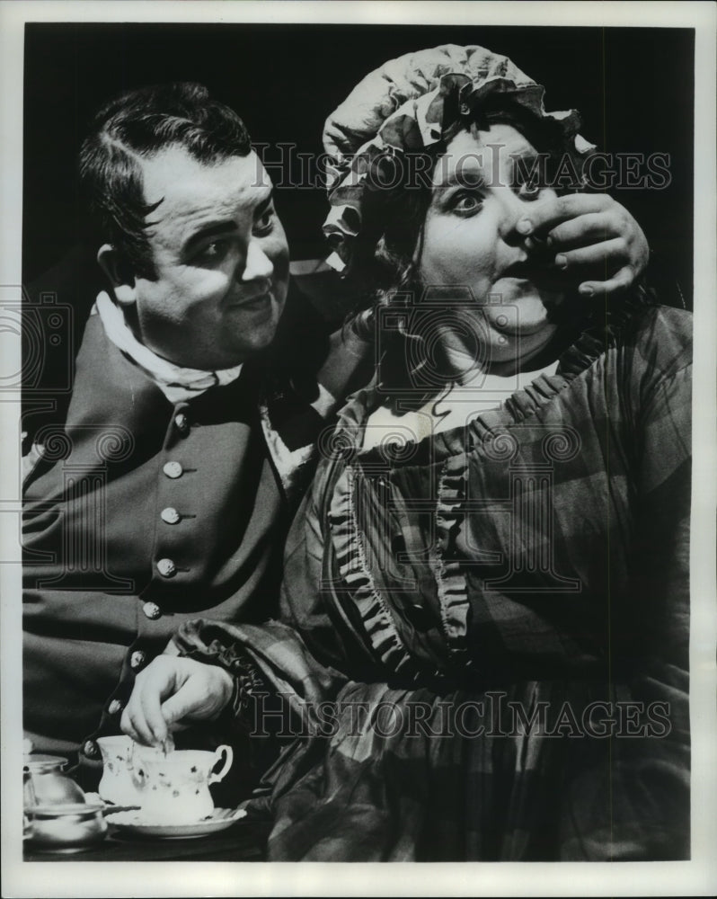 1965, Dale Malone &amp; Lu Leonard sing a duet in a scene from &quot;Oliver!&quot; - Historic Images