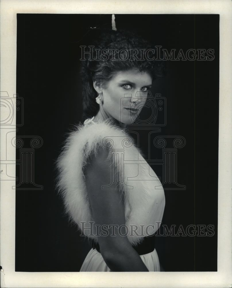 1984, United States Singer Chris Gerard looks over her shoulder - Historic Images
