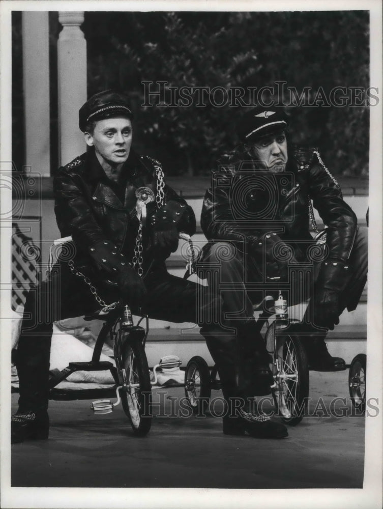 1966, Frank Gorshin, other actor on tricycles - Historic Images