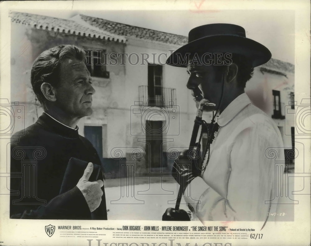 1964, Actors John Mills and Dirk Bogarde in "The Singer Not The Song" - Historic Images