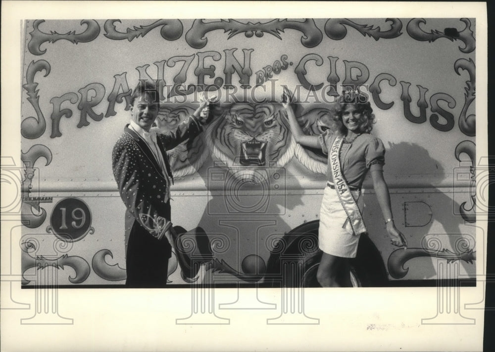 1983, Susan Peters &amp; Paul Niebauer kick off Franzen Bros. Circus - Historic Images
