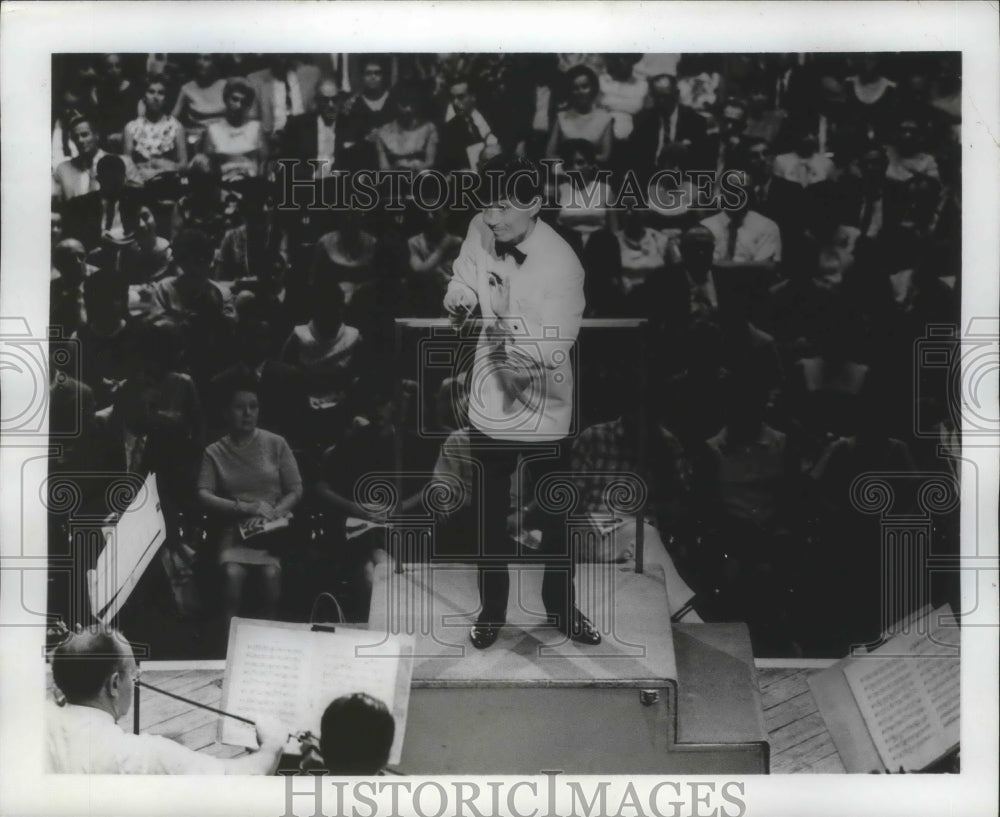 1968, Seiji Ozawa conducting orchestra at Iowa State University - Historic Images