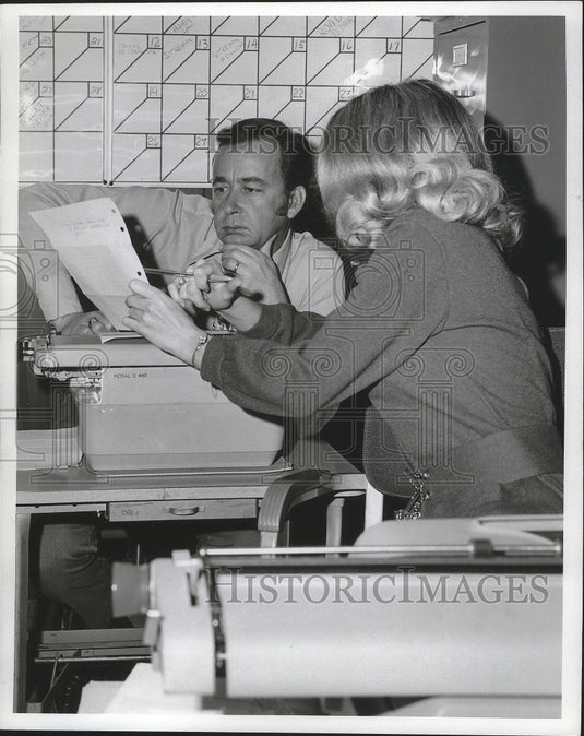 1973, Tom Hooper studies a paper - Historic Images